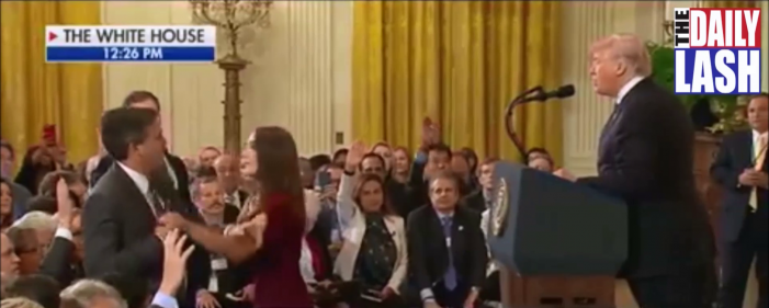 President Donald Trump stands up to CNN reporter Jim Acosta